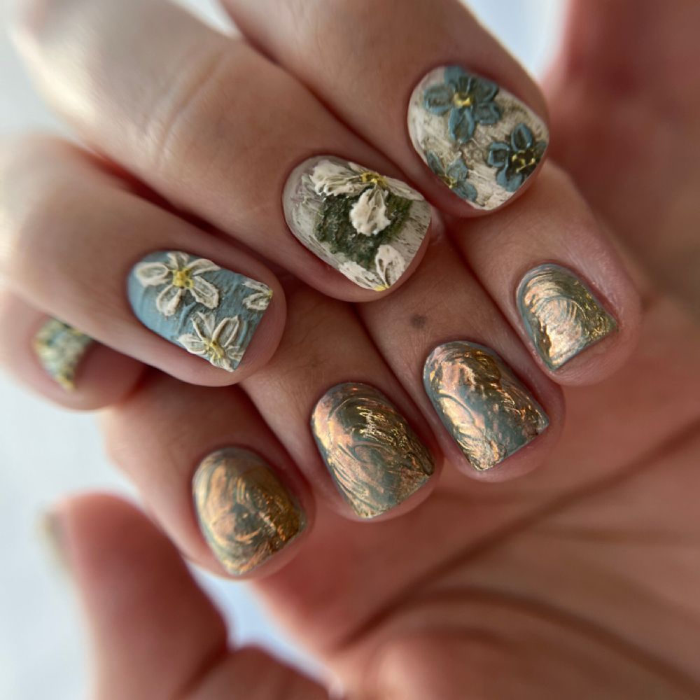 Jewelled gold nail art